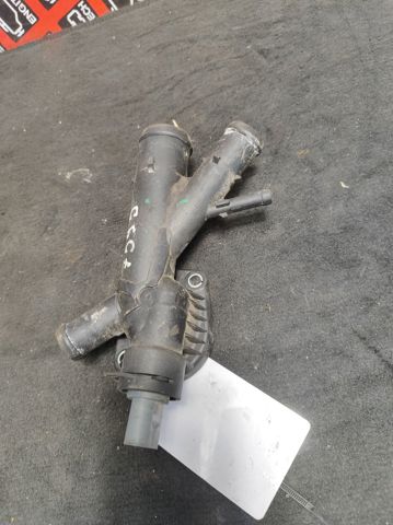 Водяний патрубок 03L121131AA VAG