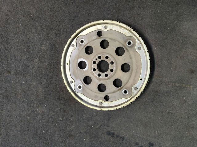 Маховик із зубчастим ободом в зборі 12331CA00A NISSAN