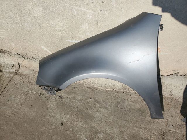 Ліве переднє крило 1K6821021A VAG