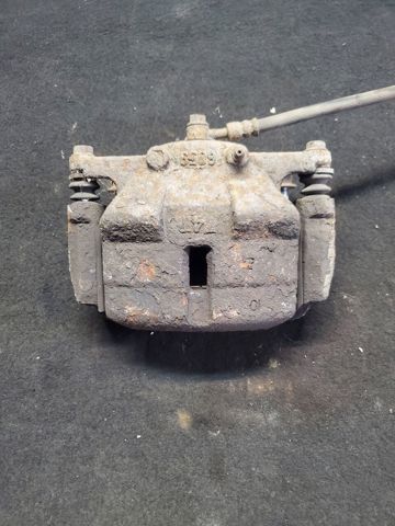 Супорт гальмівний, передній, лівий 41011JD00A NISSAN