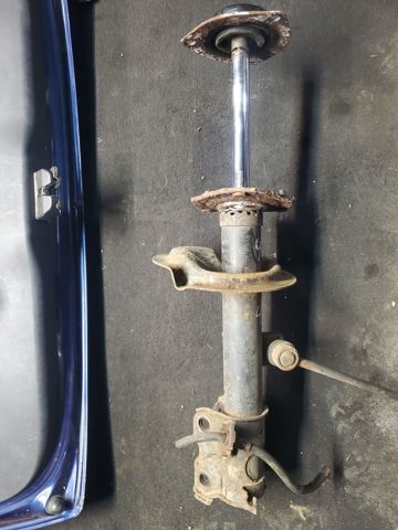 Амортизатор передньої підвіски 54302CB00J NISSAN