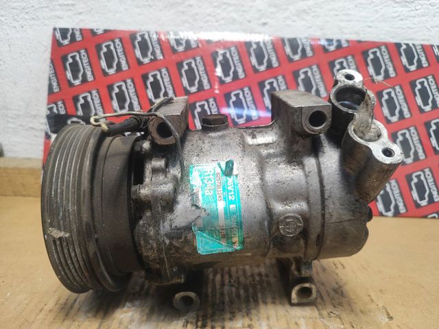 Компресор кліматичної установки 7700273801 RENAULT