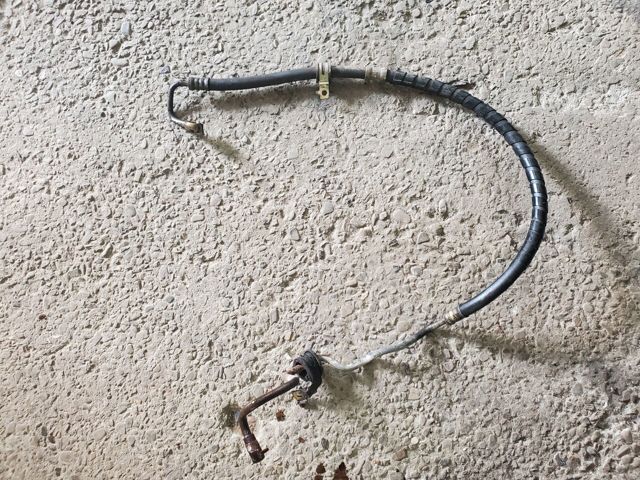 Патрубок гідропідсилювача MN184038 MITSUBISHI