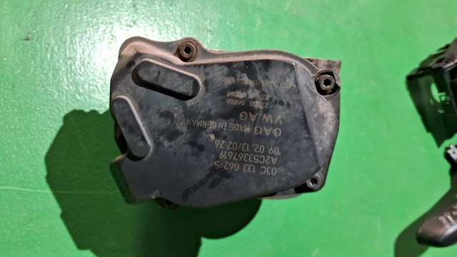 Дросільна заслінка в зборі 03C133062S VAG