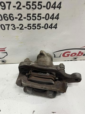 Задній гальмівний супорт лівий 440114EA0A NISSAN