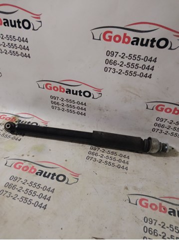 Стійка амортизатора задня 562103NF1A NISSAN