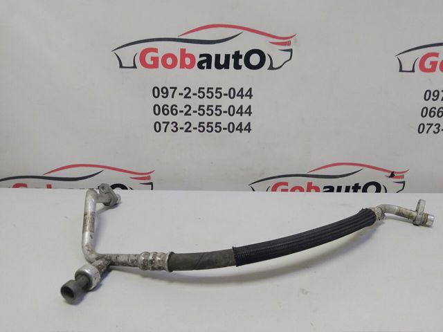 Трубка кондиціонера від компресора до радіатора 8200899766 RENAULT