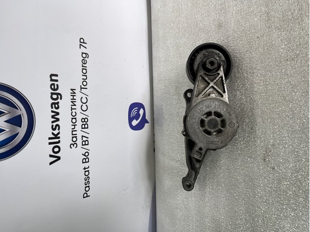 Натягувач приводного ременя 03G903315C VAG