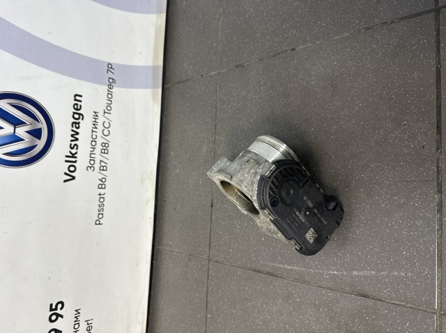 Заслінка повітряна 06K133062AG VAG