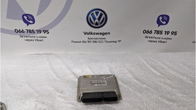 Блок електронного управління 4B0906018DC VAG