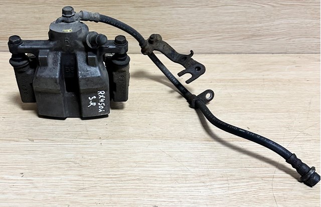 Супорт гальмівний задній правий 4783048110 TOYOTA
