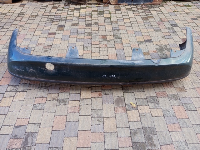 Буфер (бампер) задній 1404147 OPEL