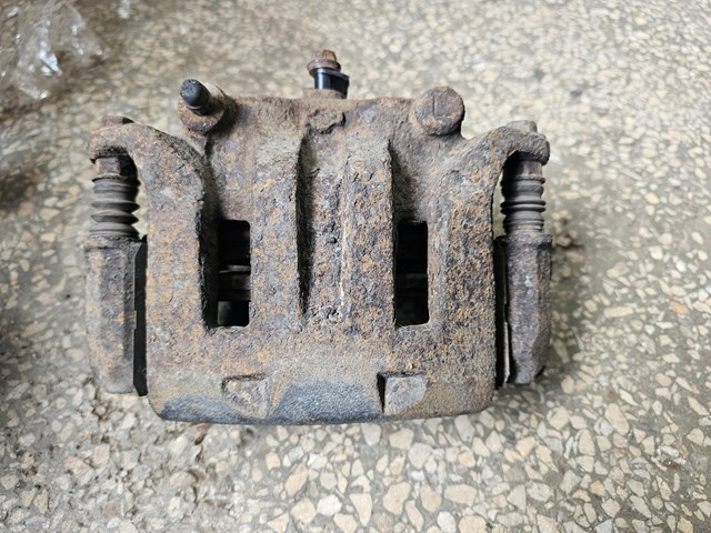 Супорт тормзной 41011VK100 NISSAN