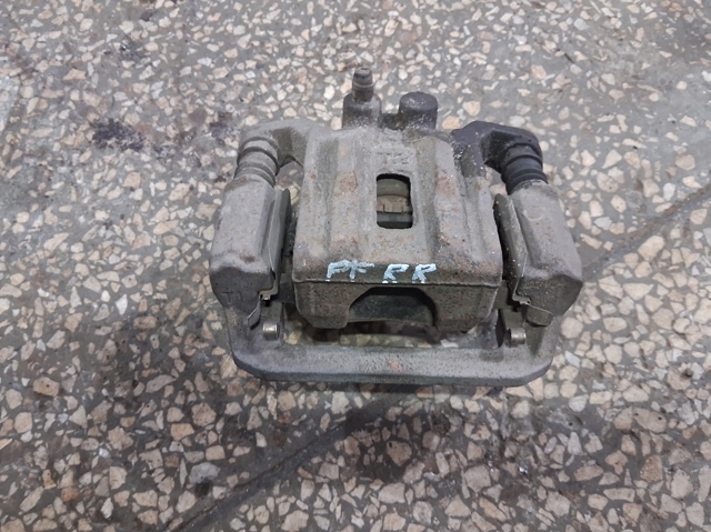 Супорт гальмівний задній правий 44001EB30A NISSAN