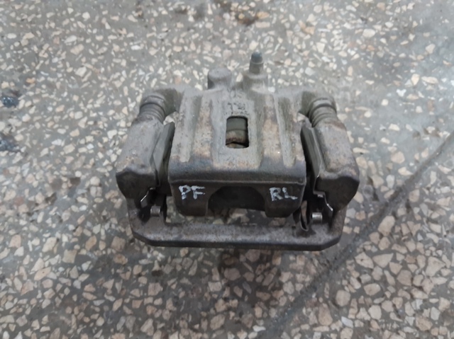 Задній гальмівний супорт лівий 44011EB30A NISSAN