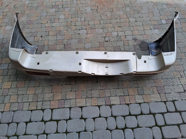 Бампер задній 7181165DD1799 SUZUKI