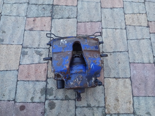 Супорт гальмівний, передній, правий 93173240 OPEL
