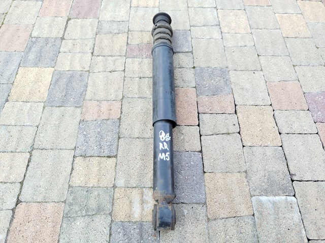 Амортизаційна стійка задня E6210AX602 NISSAN