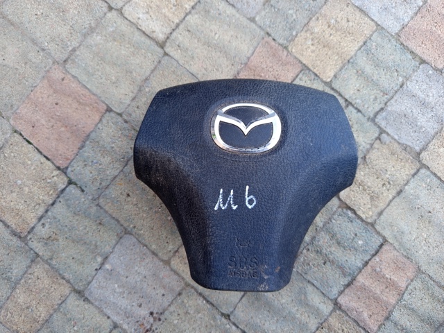 Подушка в кермі GJ6A57K00C02 MAZDA