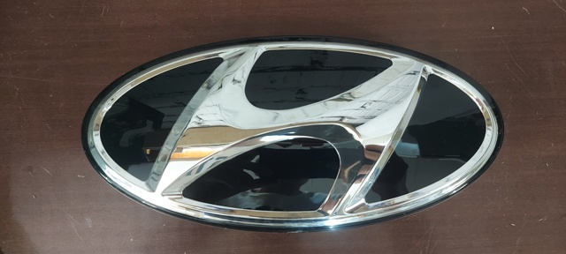 Емблема решітки радіатора 86310G8100 HYUNDAI