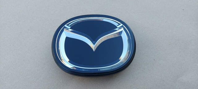 Емблема решітки радіатора BERC51730 MAZDA