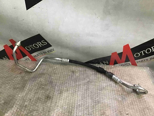 Трубка кондиціонера від компресора до радіатора A2058304003 MERCEDES