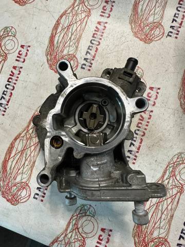 Насос вакуумний 06J145100G VAG