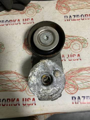 Натягувач приводного ременя 12638689 GM