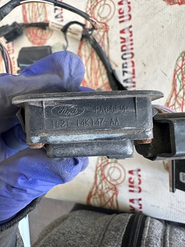 Кнопка приводу замка задніх 3/5 дверей (ляди) 1L2T14K147AA FORD