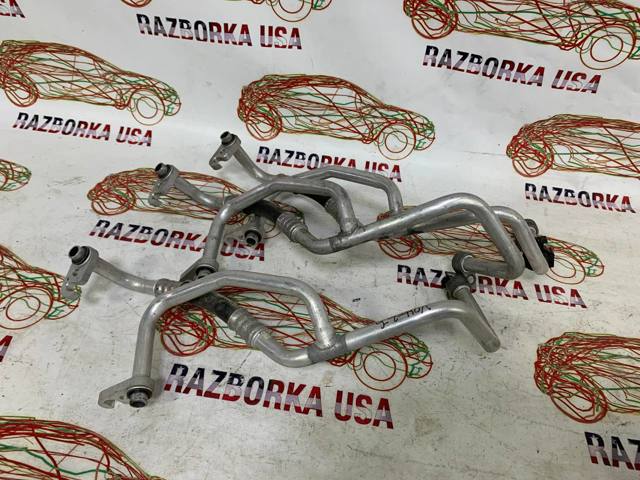 Шланг кондиціонера, від випарника до компресора 23287157 GM