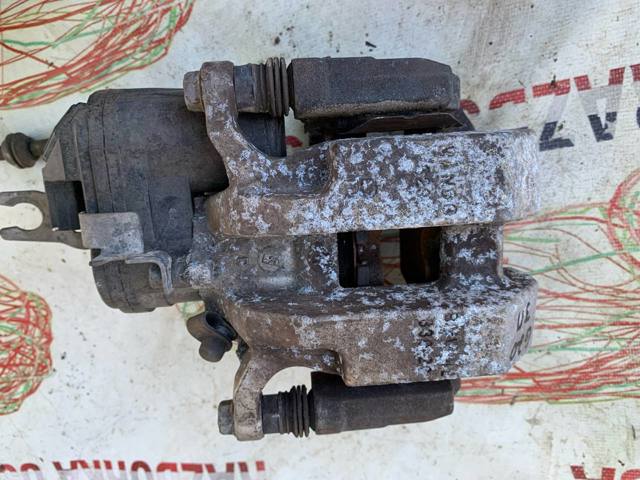 Супорт гальмівний задній правий 34208836842 BMW