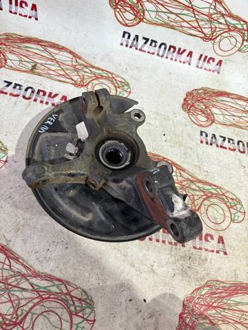 Цапфа поворотна права 400145RF0A NISSAN
