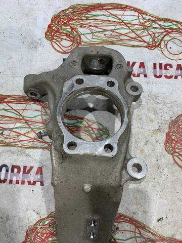 Цапфа поворотна ліва 400154GA0A NISSAN