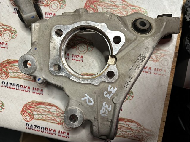 Цапфа - поворотний кулак задній, правий 430186RR1A NISSAN