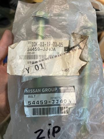 Болт кріплення передньої балки (підрамника) 54459JJ40A NISSAN