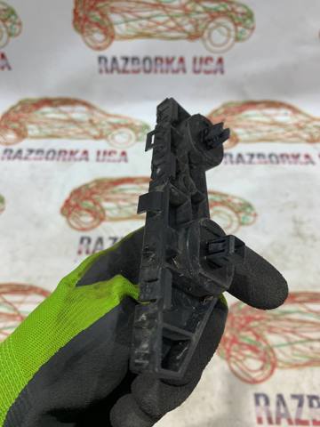 Ліве кріплення заднього бампера 852254GA0A NISSAN