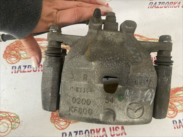 Супорт гальмівний, передній, правий B4Y03398ZB MAZDA