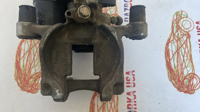 Супорт гальмівний задній правий DG9Z2552C FORD
