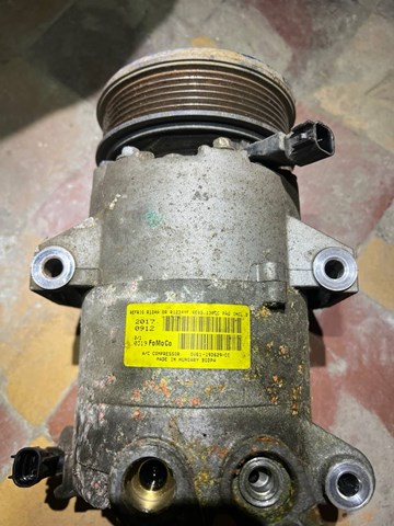 Компресор системи кондиціювання GV6119D629CC FORD