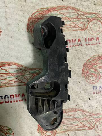 Кронштейн бампера переднього, зовнішній лівий KD45500U1 MAZDA