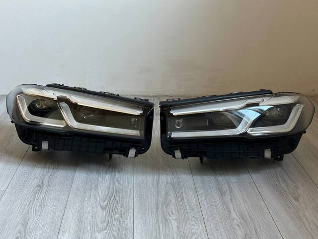 Фара передня права 9479274 BMW