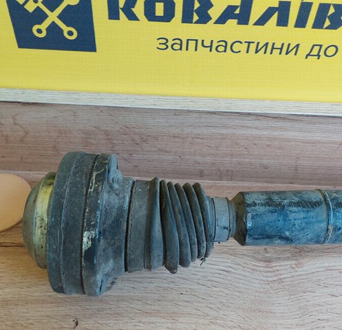 Привід передній правий 1K0407452TX VAG