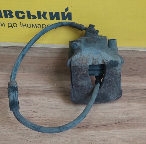 Супорт гальмівний, передній, правий 1K0615124D VAG