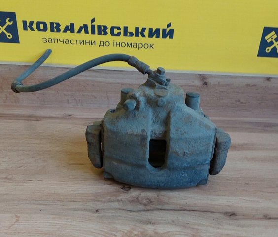 Супорт гальмівний, передній, правий 1K0615124E VAG
