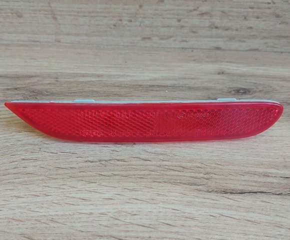 Правий катафот бампера 26560JJ90A NISSAN