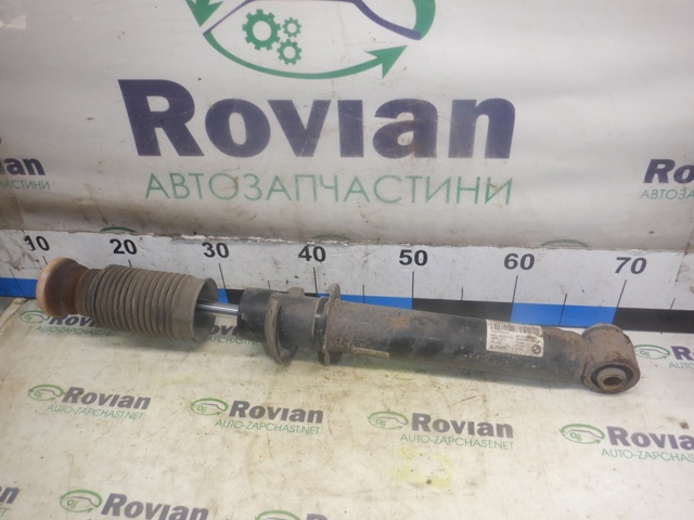 Стійка амортизатора задня 33526852231 BMW