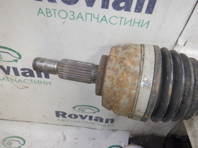 Привід передній правий 391008165R RENAULT