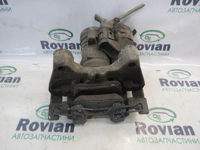 Супорт гальмівний задній правий 3Q0615406 VAG