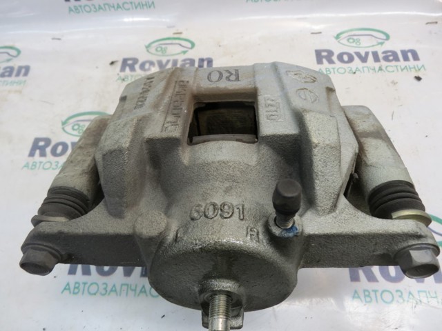 Супорт гальмівний, передній, правий 410016RR0A NISSAN