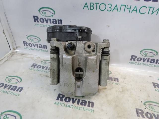 Задній гальмівний супорт лівий 440106RA0C NISSAN